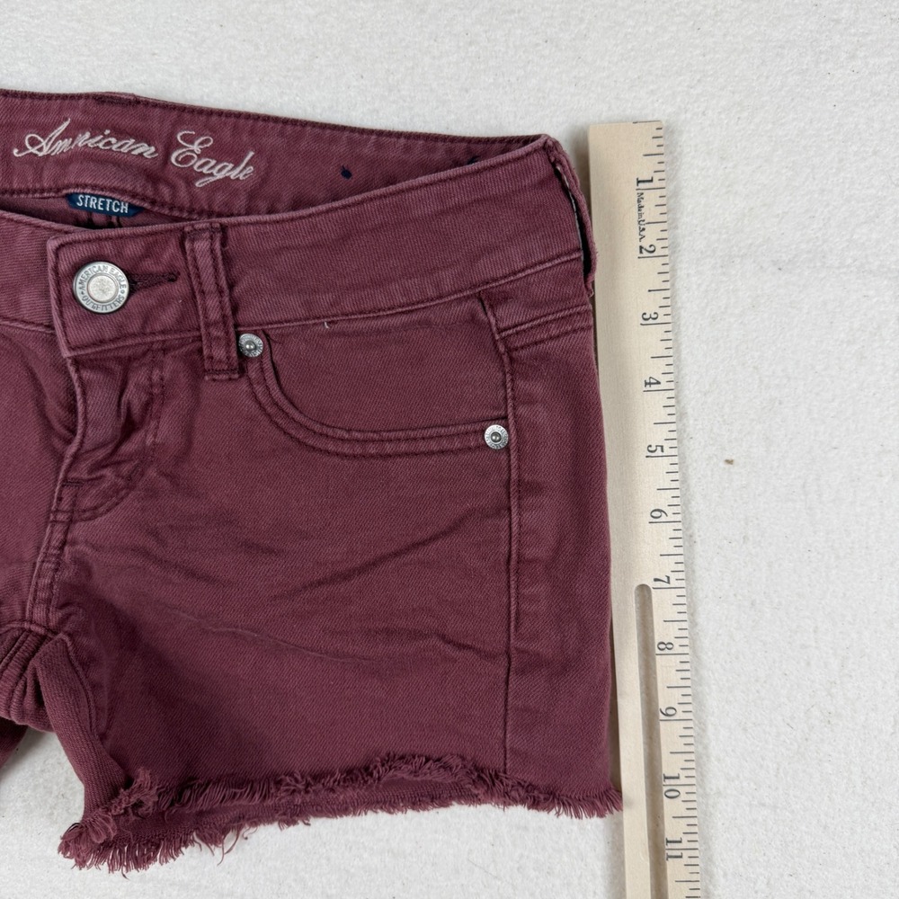 American Eagle Stretch Denim Shorts Burgundy Maroon Frayed Hem Size 0 Low Rise - Picture 3 of 7